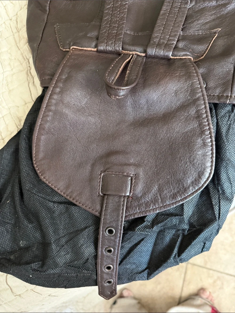 Men or women’s brown leather backpack in good condition supple clean interior